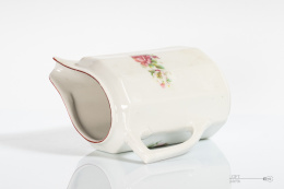 Old porcelain milk jug