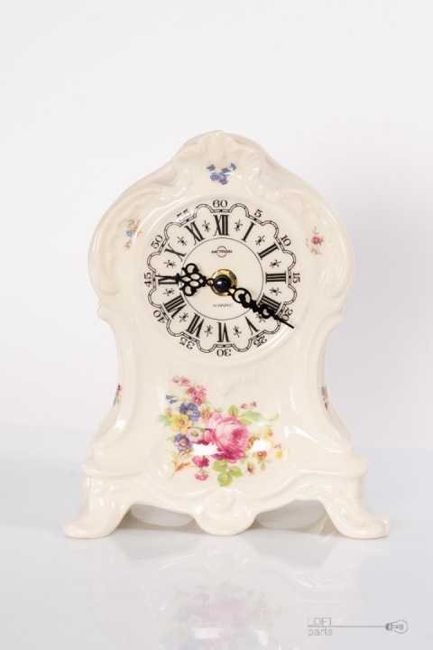 porcelanowy zegar chodzież