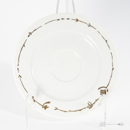 porcelanowy spodek kruk