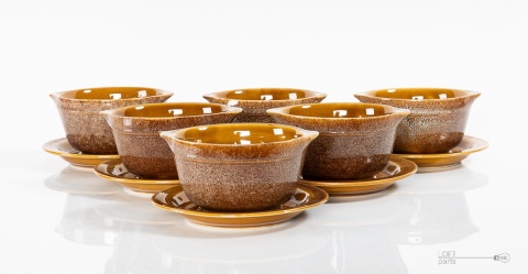 a set of bowls with saucers mirostowice